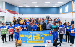 Donation of backpacks and school supplies to 12 schools across the United States