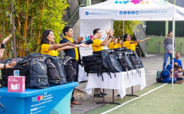 Donation of backpacks and school supplies to 12 schools across the United States